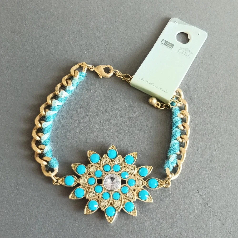 2/$15 + $4.99 Shipping Turquoise & Gold Tone Bracelet with Floral Design